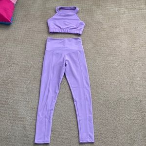Purple Onzie workout top and bottom